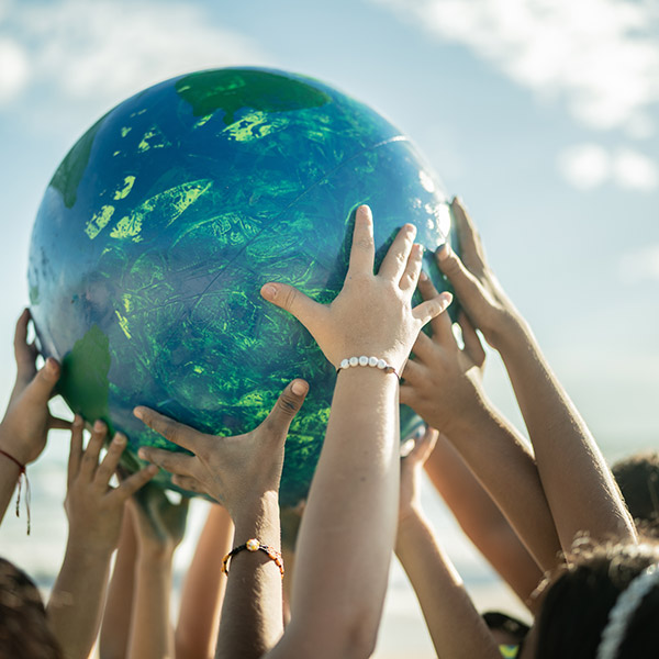globe in hands of people